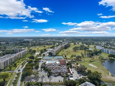 With Lake & Golf views... this corner 3 bdrm, 2 bath condo in - photo 35
