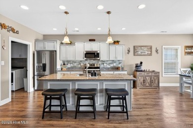 Welcome home to Bluewater Rise! This stunning 3-bedroom, 2-bath - photo 7