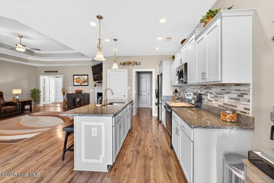 Welcome home to Bluewater Rise! This stunning 3-bedroom, 2-bath - photo 8