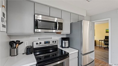 Welcome home to the Osage Vista's community. This top floor unit - photo 11