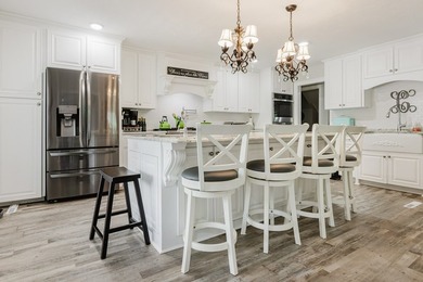 Experience luxury lake living at its finest with this stunning - photo 13