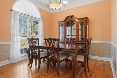 NEW PRICE! Welcome home to 104 Johns Drive, a timeless brick