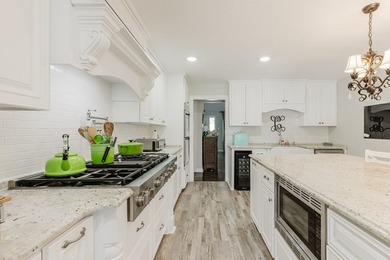 Experience luxury lake living at its finest with this stunning - photo 14