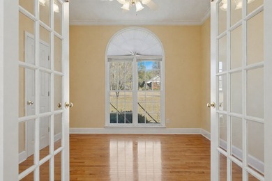 NEW PRICE! Welcome home to 104 Johns Drive, a timeless brick