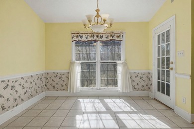 NEW PRICE! Welcome home to 104 Johns Drive, a timeless brick