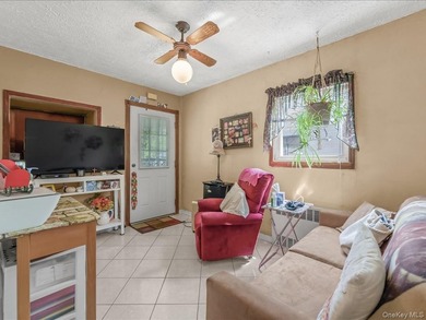 Welcome to this charming , Cape-style, single family home in the - photo 3