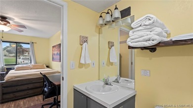 Welcome home to the Osage Vista's community. This top floor unit - photo 25