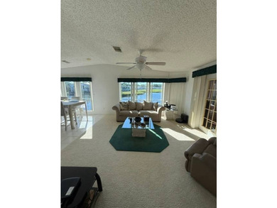 Experience luxury living in the sought-after The Hamptons Golf & - photo 5