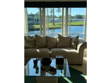 Experience luxury living in the sought-after The Hamptons Golf & - photo 7