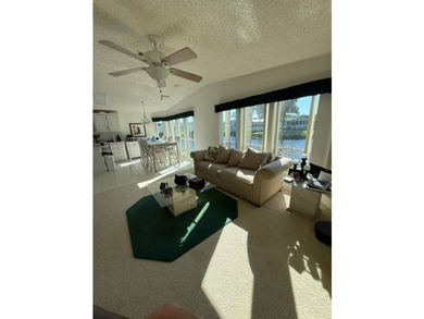 Experience luxury living in the sought-after The Hamptons Golf & - photo 8