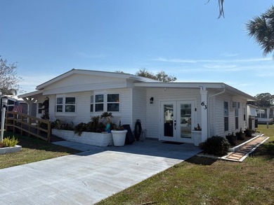 (COMPLETELY RENOVATED FROM TOP TO BOTTOM) Welcome to the very - photo 3