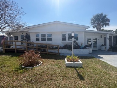 (COMPLETELY RENOVATED FROM TOP TO BOTTOM) Welcome to the very - photo 4