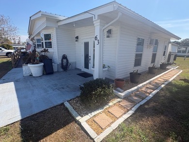(COMPLETELY RENOVATED FROM TOP TO BOTTOM) Welcome to the very - photo 5