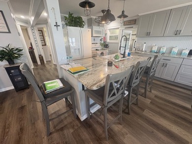 (COMPLETELY RENOVATED FROM TOP TO BOTTOM) Welcome to the very - photo 7