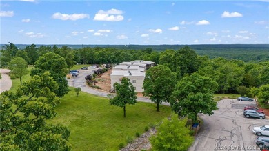 Welcome home to the Osage Vista's community. This top floor unit - photo 42