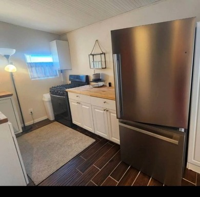 Welcome to this charming manufactured home beachy cottage style - photo 3