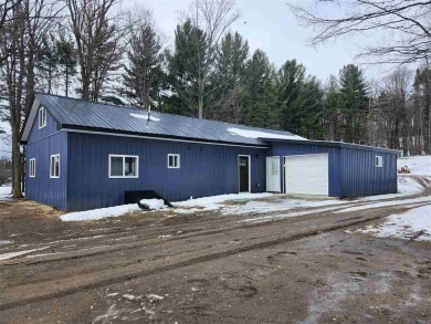 Lake Home For Sale in East Jordan, Michigan