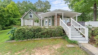 Lake Tuscaloosa home with approx. 115 +/ - water frontage. This - photo 9