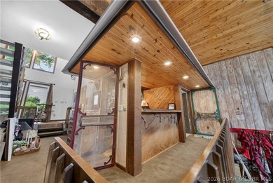 Discover a rare opportunity to own a truly distinctive lakefront - photo 13