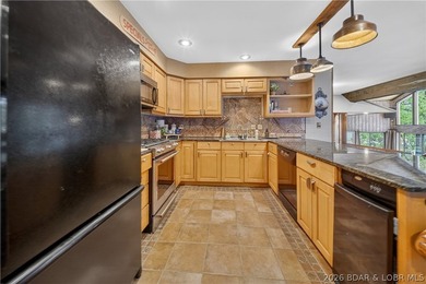 Discover a rare opportunity to own a truly distinctive lakefront - photo 18