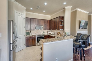 Discover this exceptional, single-level townhome featuring 3 - photo 8