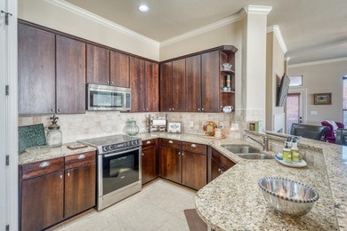 Discover this exceptional, single-level townhome featuring 3 - photo 9