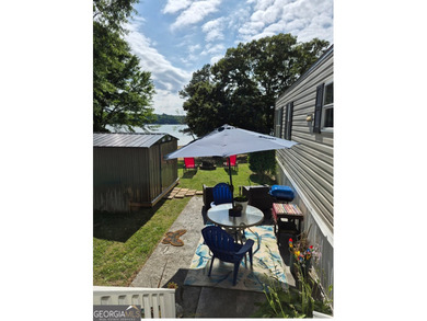 Lake Lanier Mobile Home Community - Move-In Ready Lakefront Home - photo 2