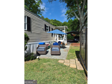 Lake Lanier Mobile Home Community - Move-In Ready Lakefront Home - photo 4