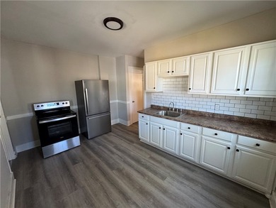 Check out this side-by-side duplex in North Winton Village! With - photo 9