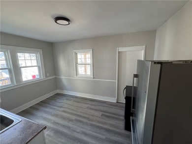 Check out this side-by-side duplex in North Winton Village! With - photo 10