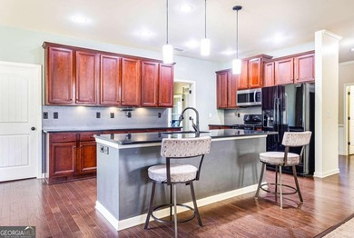 This beautifully maintained 4-bedroom, 2.5-bath home offers - photo 11