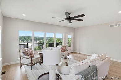 Experience elevated lake living in this new construction villa - photo 12