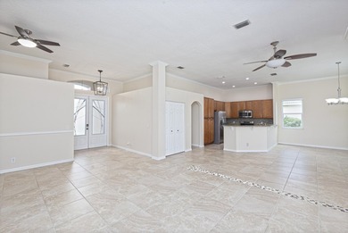 Beautifully remodeled 3BR/2BA heated saltwater pool home in - photo 12
