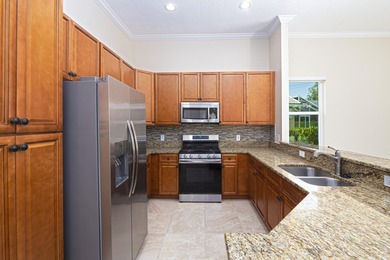 Beautifully remodeled 3BR/2BA heated saltwater pool home in - photo 13