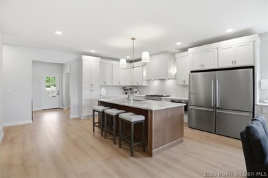 Experience elevated lake living in this new construction villa - photo 14