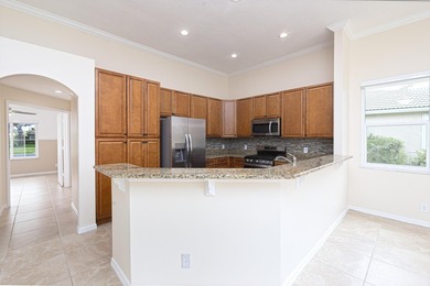 Beautifully remodeled 3BR/2BA heated saltwater pool home in - photo 15
