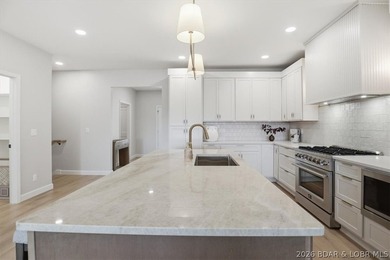 Experience elevated lake living in this new construction villa - photo 16