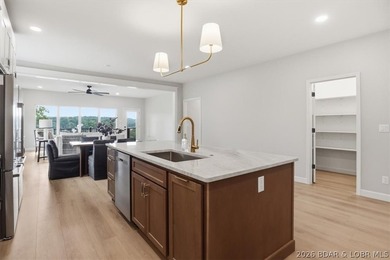Experience elevated lake living in this new construction villa - photo 18
