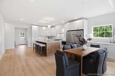 Experience elevated lake living in this new construction villa - photo 19