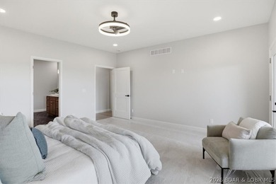 Experience elevated lake living in this new construction villa - photo 26