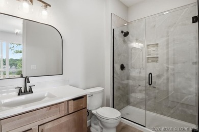 Experience elevated lake living in this new construction villa - photo 27