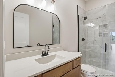 Experience elevated lake living in this new construction villa - photo 28