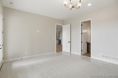 Experience elevated lake living in this new construction villa - photo 29