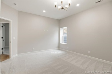 Experience elevated lake living in this new construction villa - photo 30