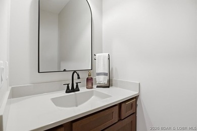 Experience elevated lake living in this new construction villa - photo 31