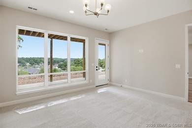 Experience elevated lake living in this new construction villa - photo 32