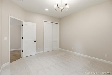 Experience elevated lake living in this new construction villa - photo 33