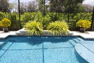Beautifully remodeled 3BR/2BA heated saltwater pool home in - photo 33