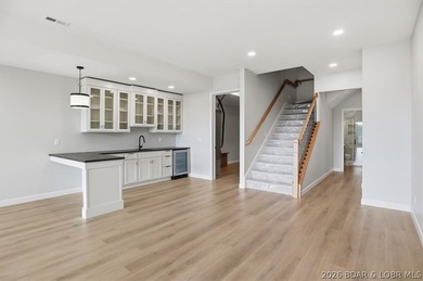 Experience elevated lake living in this new construction villa - photo 34