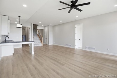 Experience elevated lake living in this new construction villa - photo 35